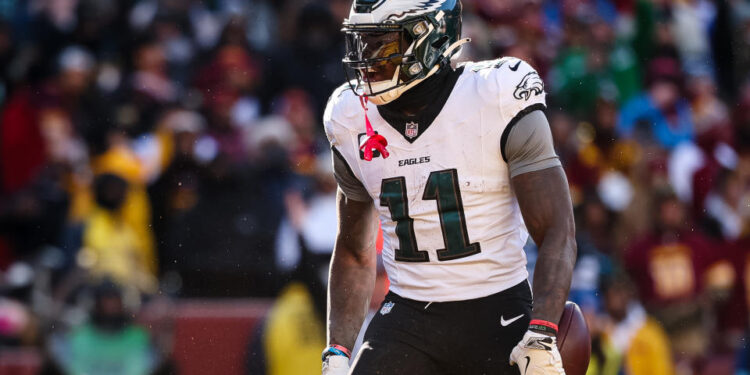 LANDOVER, MD - DECEMBER 22: A.J. Brown #11 of the Philadelphia Eagles celebrates after catching a pass for a touchdown against the Washington Commanders during the first half of the game at Northwest Stadium on December 22, 2024 in Landover, Maryland. (Photo by Scott Taetsch/Getty Images)