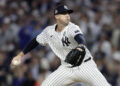 NEW YORK, NEW YORK - OCTOBER 30: (NEW YORK DAILIES OUT)  Clay Holmes #35 of the New York Yankees in action against the Los Angeles Dodgers during Game Five of the 2024 World Series at Yankee Stadium on October 30, 2024 in New York City. The Dodgers defeated the Yankees 7-6. (Photo by Jim McIsaac/Getty Images)