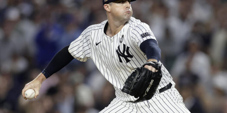 NEW YORK, NEW YORK - OCTOBER 30: (NEW YORK DAILIES OUT)  Clay Holmes #35 of the New York Yankees in action against the Los Angeles Dodgers during Game Five of the 2024 World Series at Yankee Stadium on October 30, 2024 in New York City. The Dodgers defeated the Yankees 7-6. (Photo by Jim McIsaac/Getty Images)