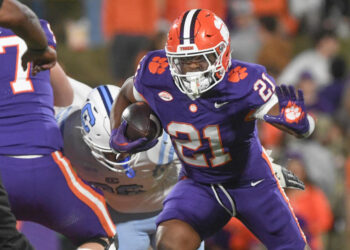 Nov 23, 2024; Clemson, South Carolina, USA; Clemson Tigers running back Jarvis Green (21) runs against The Citadel Bulldogs during the fourth quarter at Memorial Stadium. Mandatory Credit: Ken Ruinard-Imagn Images