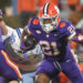 Nov 23, 2024; Clemson, South Carolina, USA; Clemson Tigers running back Jarvis Green (21) runs against The Citadel Bulldogs during the fourth quarter at Memorial Stadium. Mandatory Credit: Ken Ruinard-Imagn Images