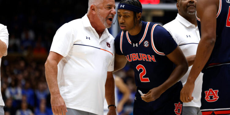 DURHAM, NORTH CAROLINA - DECEMBER 4: Head coach Bruce Pearl of the Auburn Tigers talks with Denver Jones #2 prior to their game against the Duke Blue Devils at Cameron Indoor Stadium on December 4, 2024 in Durham, North Carolina. (Photo by Lance King/Getty Images)