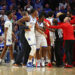 LEXINGTON, KY - DECEMBER 14: Coaches and officials attempt to break up a fight in a game between the Louisville Cardinals and the Kentucky Wildcats on December 14, 2024, at Rupp Arena in Lexington, KY. (Photo by Jeff Moreland/Icon Sportswire via Getty Images)