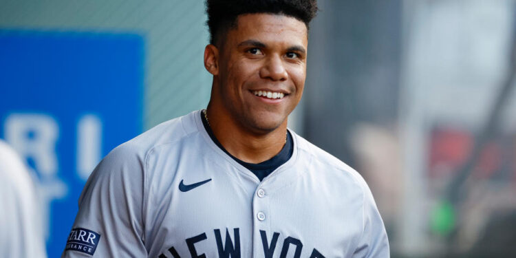 ANAHEIM, CALIFORNIA - MAY 28: Juan Soto #22 of the New York Yankees smiles in the dugout in the first inning during a game against the Los Angeles Angels at Angel Stadium of Anaheim on May 28, 2024 in Anaheim, California. (Photo by Brandon Sloter/Getty Images)