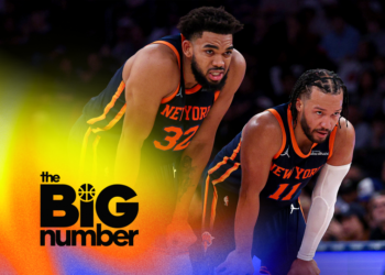 Karl-Anthony Towns #32 and Jalen Brunson #11 of the New York Knicks talk during a free throw by a teammate in the second half against the Milwaukee Bucks at Madison Square Garden on November 08, 2024 in New York City. (Photo by Elsa/Getty Images)