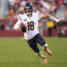 SANTA CLARA, CALIFORNIA - DECEMBER 08: Caleb Williams #18 of the Chicago Bears runs with the ball against the San Francisco 49ers in the fourth quarter at Levi's Stadium on December 08, 2024 in Santa Clara, California. (Photo by Thearon W. Henderson/Getty Images)