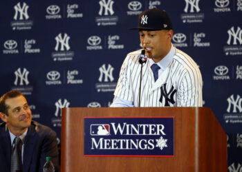 Giancarlo Stanton was introduced as a brand-new member of the New York Yankees at the 2017 winter meetings in Orlando. (Photo by Alex Trautwig/MLB via Getty Images)