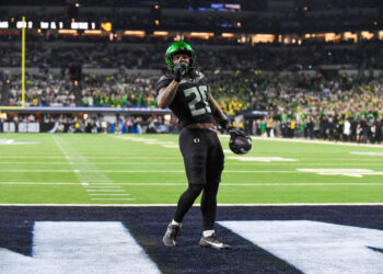 INDIANAPOLIS, INDIANA - DECEMBER 07: Jordan James #20 of the Oregon Ducks reacts after scoring a touchdown during the first half of the 2024 Big Ten Football Championship game against the Penn State Nittany Lions at Lucas Oil Stadium on December 07, 2024 in Indianapolis, Indiana. (Photo by Aaron J. Thornton/Getty Images)