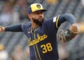 Sep 26, 2024; Pittsburgh, Pennsylvania, USA; Milwaukee Brewers relief pitcher Devin Williams (38) pitches against the Pittsburgh Pirates during the ninth inning at PNC Park. The Brewers won 5-2.