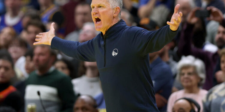 DENVER, COLORADO - DECEMBER 03: Head coach Steve Kerr of the Golden State Warriors questions the officials while playing against the Denver Nuggets in the fourth quarter of the Emirates NBA Cup at Ball Arena on December 3, 2024 in Denver, Colorado. NOTE TO USER: User expressly acknowledges and agrees that, by downloading and or using this photograph, User is consenting to the terms and conditions of the Getty Images License Agreement.  (Photo by Matthew Stockman/Getty Images)