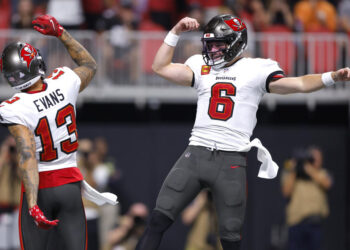 Baker Mayfield and Mike Evans can help their own pocketbooks, the Bucs' playoff chances and fantasy managers with a big finish to the season. (Photo by Todd Kirkland/Getty Images)