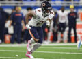 Chicago Bears wide receiver DJ Moore runs in motion during the first half of an NFL football game against the Detroit Lions in Detroit, Thursday, Nov. 28, 2024. The Lions won 23-20. (AP Photo/David Dermer)