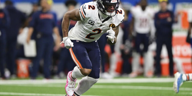 Chicago Bears wide receiver DJ Moore runs in motion during the first half of an NFL football game against the Detroit Lions in Detroit, Thursday, Nov. 28, 2024. The Lions won 23-20. (AP Photo/David Dermer)