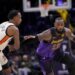 Los Angeles Lakers forward LeBron James (23) dribbles against Detroit Pistons forward Ronald Holland II.