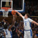 Dec 4, 2024; Durham, North Carolina, USA; Duke Blue Devils forward Cooper Flagg (2) blocks a shot by Auburn Tigers guard Denver Jones (2) during the second half at Cameron Indoor Stadium.  The Blue Devils won 84-78.   Mandatory Credit: Rob Kinnan-Imagn Images