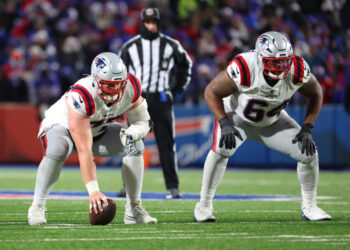 ORCHARD PARK, NEW YORK - DECEMBER 22: Layden Robinson #64 of the New England Patriots waits for the snap against the Buffalo Bills during a game at Highmark Stadium on December 22, 2024 in Orchard Park, New York. (Photo by Timothy T Ludwig/Getty Images)