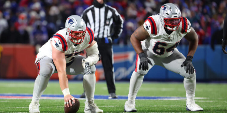 ORCHARD PARK, NEW YORK - DECEMBER 22: Layden Robinson #64 of the New England Patriots waits for the snap against the Buffalo Bills during a game at Highmark Stadium on December 22, 2024 in Orchard Park, New York. (Photo by Timothy T Ludwig/Getty Images)