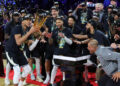 LAS VEGAS, NEVADA - DECEMBER 17: Giannis Antetokounmpo (L) #34 of the Milwaukee Bucks lifts the championship trophy as he celebrates with teammates, including Damian Lillard (C) #0, after the Bucks defeated the Oklahoma City Thunder 97-81 to win the championship game of the Emirates NBA Cup at T-Mobile Arena on December 17, 2024 in Las Vegas, Nevada. NOTE TO USER: User expressly acknowledges and agrees that, by downloading and or using this photograph, User is consenting to the terms and conditions of the Getty Images License Agreement. (Photo by Ethan Miller/Getty Images)