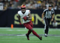 NEW ORLEANS, LOUISIANA - DECEMBER 15: Brian Robinson Jr. #8 of the Washington Commanders runs with the ball against the New Orleans Saints during a game at Caesars Superdome on December 15, 2024 in New Orleans, Louisiana. (Photo by Jonathan Bachman/Getty Images)