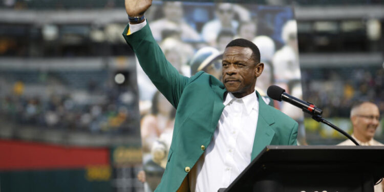 OAKLAND, CA - SEPTEMBER 5: Rickey Henderson addresses the crowd during a pregame ceremony introducing the first members of the Oakland Athletics Hall of Fame prior to the game between the Athletics and the New York Yankees on September 5, 2018 in Oakland, California. The Athletics defeated the Yankees 8-2. (Photo by Michael Zagaris/Oakland Athletics/Getty Images)