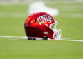 LAS VEGAS, NEVADA - SEPTEMBER 30: A UNLV Rebels helmet sits on the field during the second half of a game between the UNLV Rebels and the Hawaii Warriors at Allegiant Stadium on September 30, 2023 in Las Vegas, Nevada. Rebels defeat the Warriors 44-20. (Photo by Louis Grasse/Getty Images)