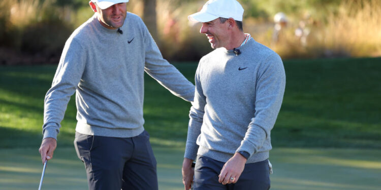 LAS VEGAS, NEVADA - DECEMBER 17: Scottie Scheffler (L) and Rory McIlroy of the PGA Tour talk during The Showdown: McIlroy and Scheffler v DeChambeau and Koepka at Shadow Creek Golf Course on December 17, 2024 in Las Vegas, Nevada.  (Photo by Kevin C. Cox/Getty Images for The Showdown)