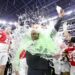 UNLV interim head coach Del Alexander is doused in a sports drink after leading the Rebels to an L.A. Bowl win over Cal