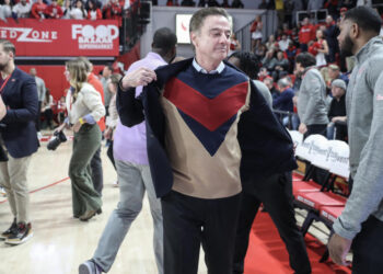 St. John's Red Storm head coach Rick Pitino wears a sweater in honor of the late Lou Carnesecca. (Wendell Cruz-Imagn Images)