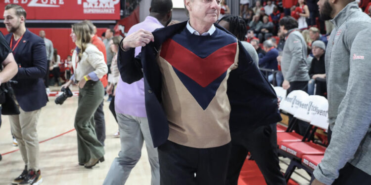 St. John's Red Storm head coach Rick Pitino wears a sweater in honor of the late Lou Carnesecca. (Wendell Cruz-Imagn Images)