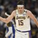 Los Angeles Lakers guard Austin Reaves (15) celebrates his three-point basket.