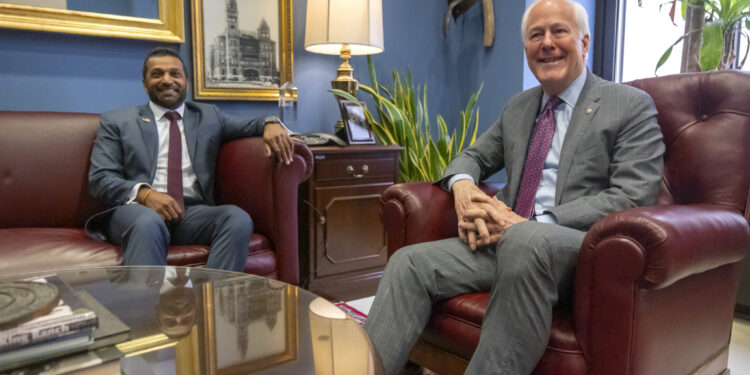 Kash Patel, left, President-elect Donald Trump's pick to be the director of the FBI, meets with Sen. John Cornyn, R-Texas, in Cornyn's office on Capitol Hill, Monday, Dec. 9, 2024, in Washington. (AP Photo/Mark Schiefelbein)