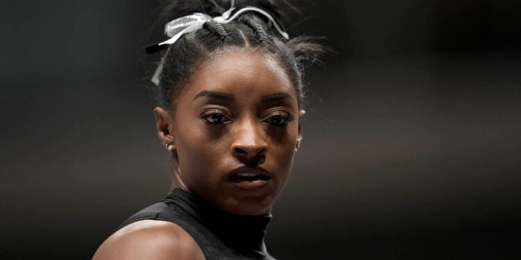 Simone Biles warms up