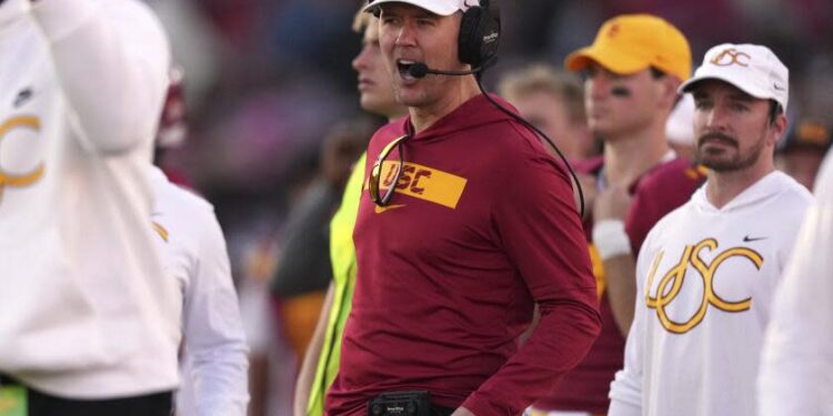 Southern California head coach Lincoln Riley yells to his team during the second half of an NCAA college football game against Nebraska, Saturday, Nov. 16, 2024, in Los Angeles. (AP Photo/Mark J. Terrill)