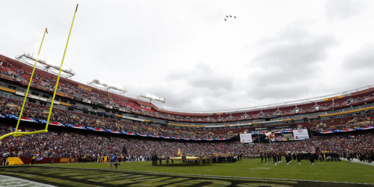 LANDOVER, MARYLAND - NOVEMBER 06: A general view of the pregame flyover prior to the game between the Minnesota Vikings and the Washington Commanders at FedExField on November 06, 2022 in Landover, Maryland. (Photo by Todd Olszewski/Getty Images)