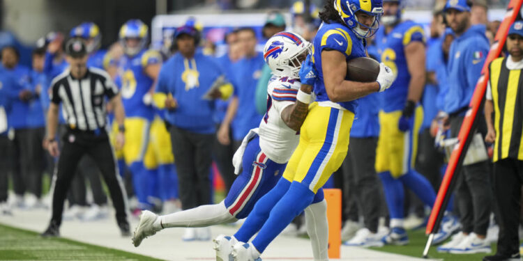 Yes, both of Puka Nacua's feet are inbounds. (AP Photo/Eric Thayer)