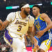 Dec 25, 2024; San Francisco, California, USA; Los Angeles Lakers forward Anthony Davis (3) dribbles against Golden State Warriors forward Trayce Jackson-Davis (32) during the first quarter at Chase Center. Mandatory Credit: Darren Yamashita-Imagn Images