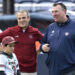 Illinois head coach Bret Bielema, right, and South Carolina head coach Shane Beamer chat on the field before the Citrus Bowl NCAA college football game, Tuesday, Dec. 31, 2024, in Orlando, Fla. (AP Photo/Phelan M. Ebenhack)