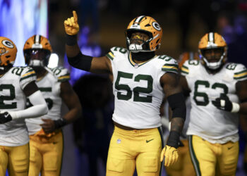 DETROIT, MICHIGAN - DECEMBER 5: Rashan Gary #52 of the Green Bay Packers runs onto the field prior to an NFL football game against the Detroit Lions at Ford Field on December 5, 2024 in Detroit, Michigan. (Photo by Kevin Sabitus/Getty Images)