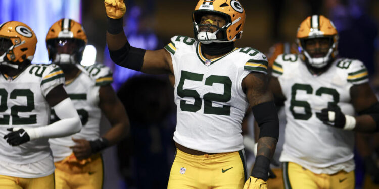 DETROIT, MICHIGAN - DECEMBER 5: Rashan Gary #52 of the Green Bay Packers runs onto the field prior to an NFL football game against the Detroit Lions at Ford Field on December 5, 2024 in Detroit, Michigan. (Photo by Kevin Sabitus/Getty Images)