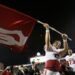 Baker Mayfield waves the OU flag