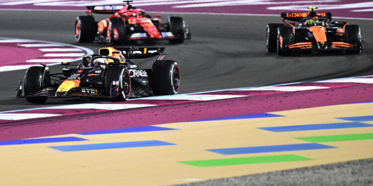 LUSAIL CITY, QATAR - DECEMBER 01: Max Verstappen of the Netherlands driving the (1) Oracle Red Bull Racing RB20 leads Lando Norris of Great Britain driving the (4) McLaren MCL38 Mercedes and Charles Leclerc of Monaco driving the (16) Ferrari SF-24 on track during the F1 Grand Prix of Qatar at Lusail International Circuit on December 01, 2024 in Lusail City, Qatar. (Photo by Pauline Ballet - Formula 1/Formula 1 via Getty Images)