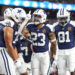 Nov 28, 2024; Arlington, Texas, USA;  Dallas Cowboys running back Rico Dowdle (23) celebrates with teammates after scoring a touchdown against the New York Giants during the second half at AT&T Stadium. Mandatory Credit: Chris Jones-Imagn Images