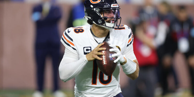 DETROIT, MICHIGAN - NOVEMBER 28: Caleb Williams #18 of the Chicago Bears plays against the Detroit Lions at Ford Field on November 28, 2024 in Detroit, Michigan. (Photo by Gregory Shamus/Getty Images)