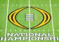 College Football Playoff logo on the field