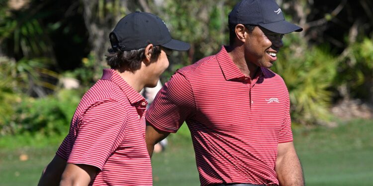 Tiger and Charlie Woods celebrate