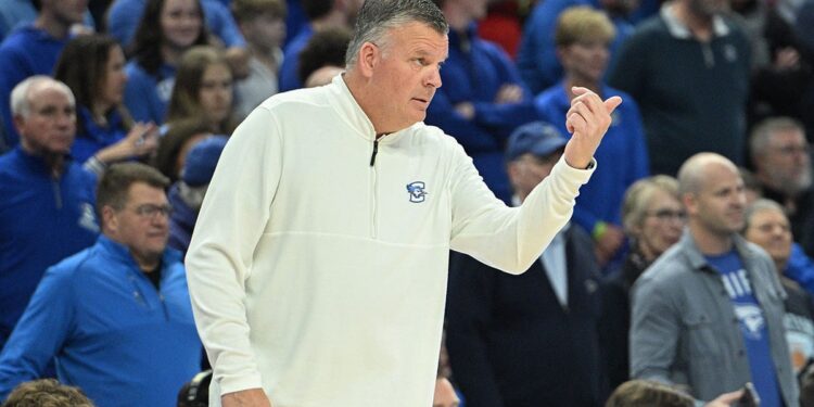 Greg McDermott coaches a game