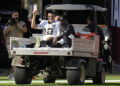 Las Vegas Raiders quarterback Aidan O'Connell left Sunday's game with air cast on his left leg. (AP Photo/Chris O'Meara)