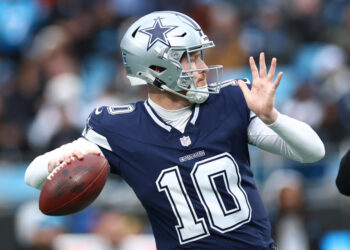 CHARLOTTE, NORTH CAROLINA - DECEMBER 15: Cooper Rush #10 of the Dallas Cowboys attempts a pass during the second half of the game against the Carolina Panthers at Bank of America Stadium on December 15, 2024 in Charlotte, North Carolina. (Photo by Jared C. Tilton/Getty Images)