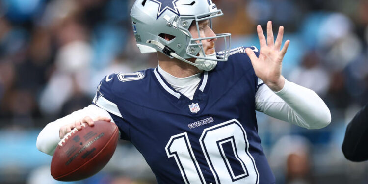 CHARLOTTE, NORTH CAROLINA - DECEMBER 15: Cooper Rush #10 of the Dallas Cowboys attempts a pass during the second half of the game against the Carolina Panthers at Bank of America Stadium on December 15, 2024 in Charlotte, North Carolina. (Photo by Jared C. Tilton/Getty Images)