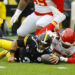 PITTSBURGH, PENNSYLVANIA - DECEMBER 25: Russell Wilson #3 of the Pittsburgh Steelers recovers his own fumble against Mike Danna #51 of the Kansas City Chiefs /d1 at Acrisure Stadium on December 25, 2024 in Pittsburgh, Pennsylvania. (Photo by Justin K. Aller/Getty Images)